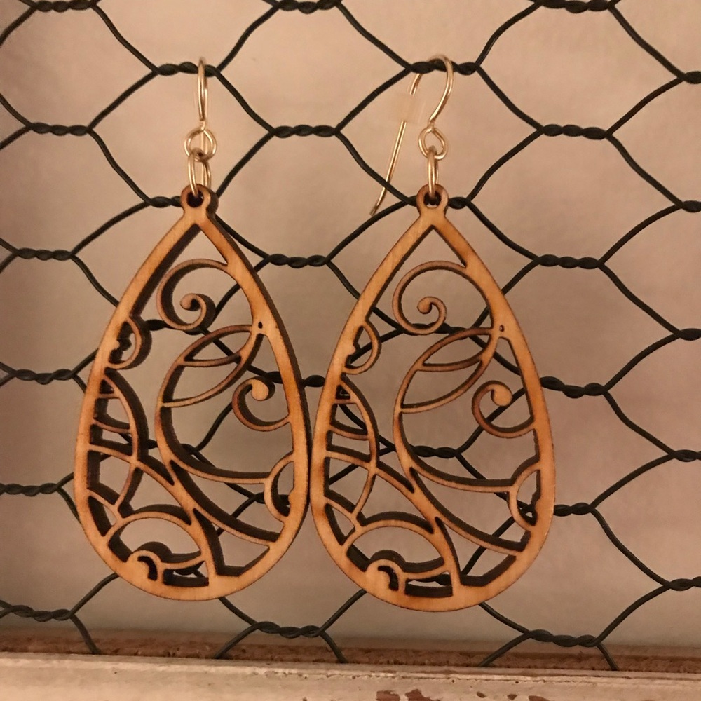 Hand carved wooden earrings. Super light weight